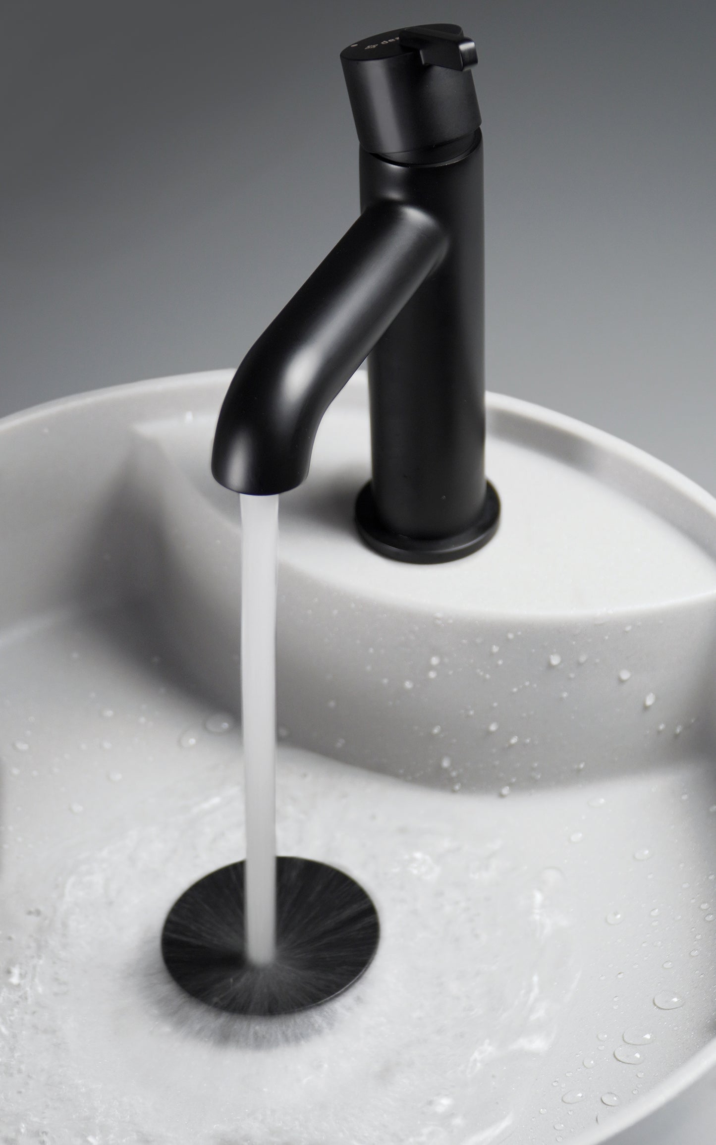 Deante SILIA Granit-Aufsatzwaschtisch mit Armaturenbank rund Ø 36 cm Alabaster