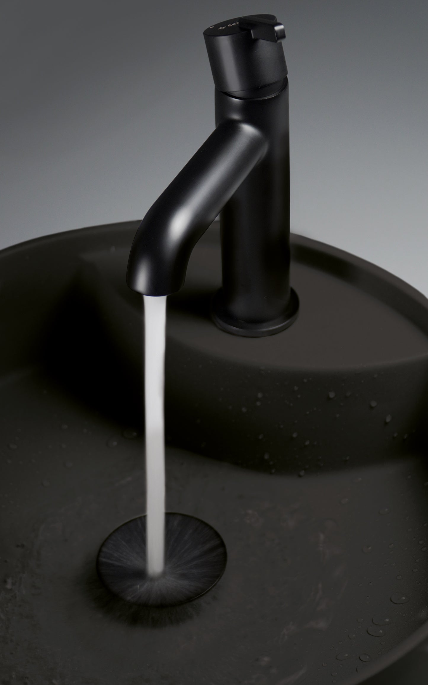 Deante SILIA Granit-Aufsatzwaschtisch mit Armaturenbank rund Ø 36 cm Schwarz